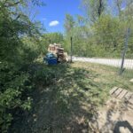Freycinet barge 38.97 m BONANZA (1957) – bankside garden with woodpile