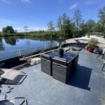 Freycinet barge 38.97 m BONANZA (1957) – deck terrace and lounge set facing the river