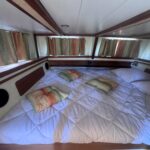 Kim Marine trawler Le Feeling (1977) – double bed and portholes in the cabin