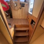 Kim Marine trawler Le Feeling (1977) – inner helm station with wooden wheel