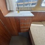 Locaboat 935 canal cruiser Kerplouf (1986) – chest of drawers and worktop in the saloon