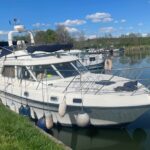 Fairline 36 motor yacht Stella (1989) – starboard bow view moored at the quay