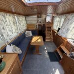 Smelne 1140 Dutch motor cruiser Dreamflower (1985) – main saloon with table and settees