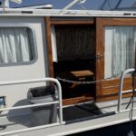 Smelne 1140 Dutch motor cruiser Dreamflower (1985) – side door and starboard side deck