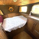 Locaboat 930 canal cruiser Sérénité (1981) – forward cabin, double bed and storage