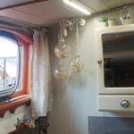 Dutch Hagenaar barge 18 m ANNA (1911) – shower room with mirror cabinet and porthole