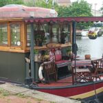 Dutch Hagenaar barge 18 m ANNA (1911) – covered aft deck and wheelhouse seen from the quay