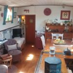 Dutch Hagenaar barge 18 m ANNA (1911) – saloon with desk area and dining table