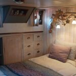 Dutch Hagenaar barge 18 m ANNA (1911) – cabin with double bed and light wood storage