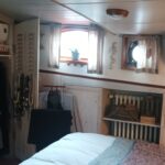 Dutch Hagenaar barge 18 m ANNA (1911) – cabin with open wardrobe and air conditioning