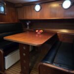 Bronsveen Kotter 1480 Dutch motor yacht Petit Michou (2002) – wood and leather dinette facing benches