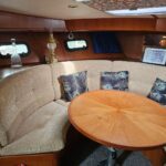 Aquanaut 11 m Dutch motor cruiser Aldebaran (1994) – forward dinette convertible to berth