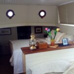 Dutch Luxe-Motor barge 14.50 m (1928) – full-width double berth with portholes