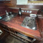 Dutch Tjalk sailing barge Osseo (1890) – galley worktop with sink and gas hob