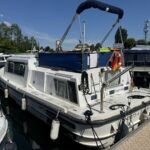 Connoisseur 1135 river cruiser Ingrine (1986) – stern exterior view with cockpit cover