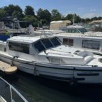 Connoisseur 1135 river cruiser Ingrine (1986) – starboard exterior view at the quay