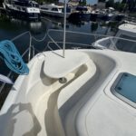 Nicols 1100 river cruiser Lodève (1998) – bow seating area with removable table
