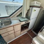 Nicols 1100 river cruiser Lodève (1998) – galley with sink, oven and fridge