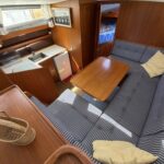 Van Vliet Atico 38 motor cruiser Joanne (1994) – saloon with galley and forward cabin access