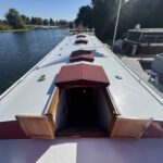 Dutch Luxe-Motor barge Dulcinea (1929) – foredeck with red-canvas hatches and open companionway