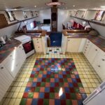 Dutch Luxe-Motor barge Dulcinea (1929) – colourful tiled galley opening onto the saloon