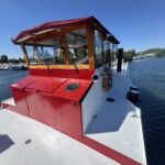Dutch Luxe-Motor barge Dulcinea (1929) – wheelhouse with red canopy seen from the foredeck