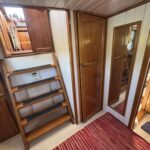 Dutch Luxe-Motor barge Dulcinea (1929) – aft cabin ladder, wooden doors and mirror