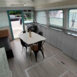 Vetus 1200 Damier Dutch motor cruiser (1992) – saloon with dining table and convertible settee