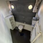 Vetus 1200 Damier Dutch motor cruiser (1992) – separate toilet with washbasin and portholes