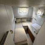 Vetus 1200 Damier Dutch motor cruiser (1992) – cabin with two berths and storage