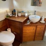 Dutch Luxe-Motor barge 14.50 m (1928) – shower room with WC, basin and wooden vanity unit