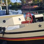 Dutch Luxe-Motor barge 14.50 m (1928) – foredeck with red emergency steering wheel