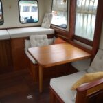 Dutch Luxe-Motor barge 14.50 m (1928) – wheelhouse dining corner with cushioned benches