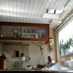 Dutch Luxe-Motor barge 14.50 m (1928) – galley worktop with glass cabinet and deck hatch