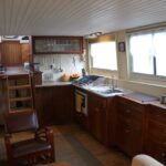 Dutch Luxe-Motor barge 14.50 m (1928) – fitted walnut galley with gas hob and oven