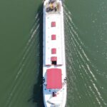 Dutch Luxe-Motor barge Dulcinea (1929) – aerial drone view of the barge underway, deck seen from above