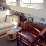 Dutch Luxe-Motor barge 14.50 m (1928) – seating area with sofa and wooden armchair
